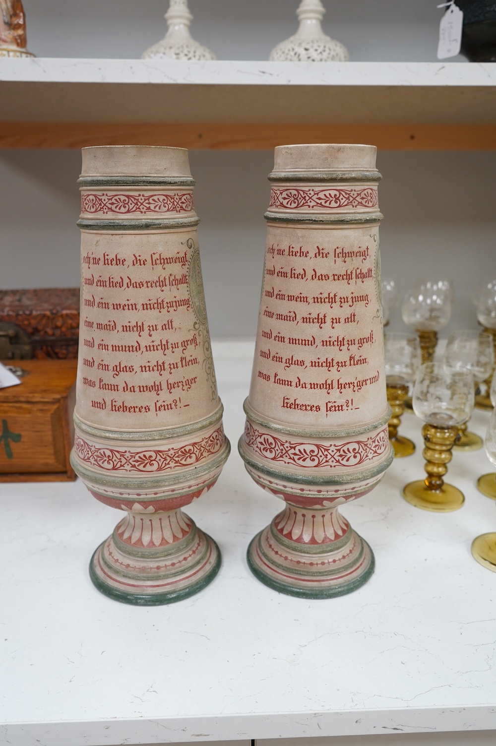 A pair of German stoneware mantel piece garniture vases, monogramed to base, 38cm high. Condition - fair